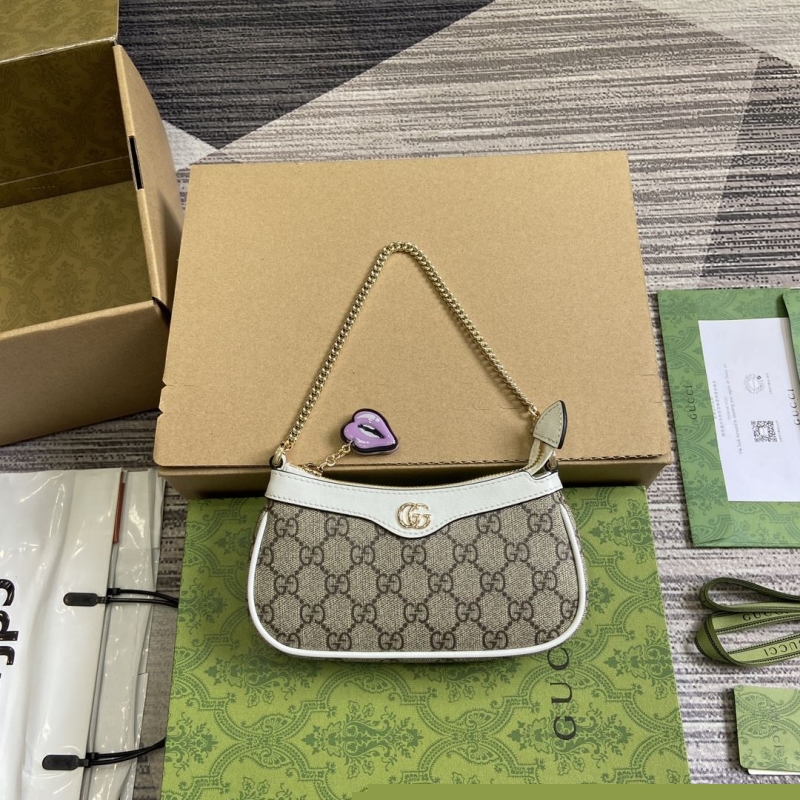 G*u*i top handle bags